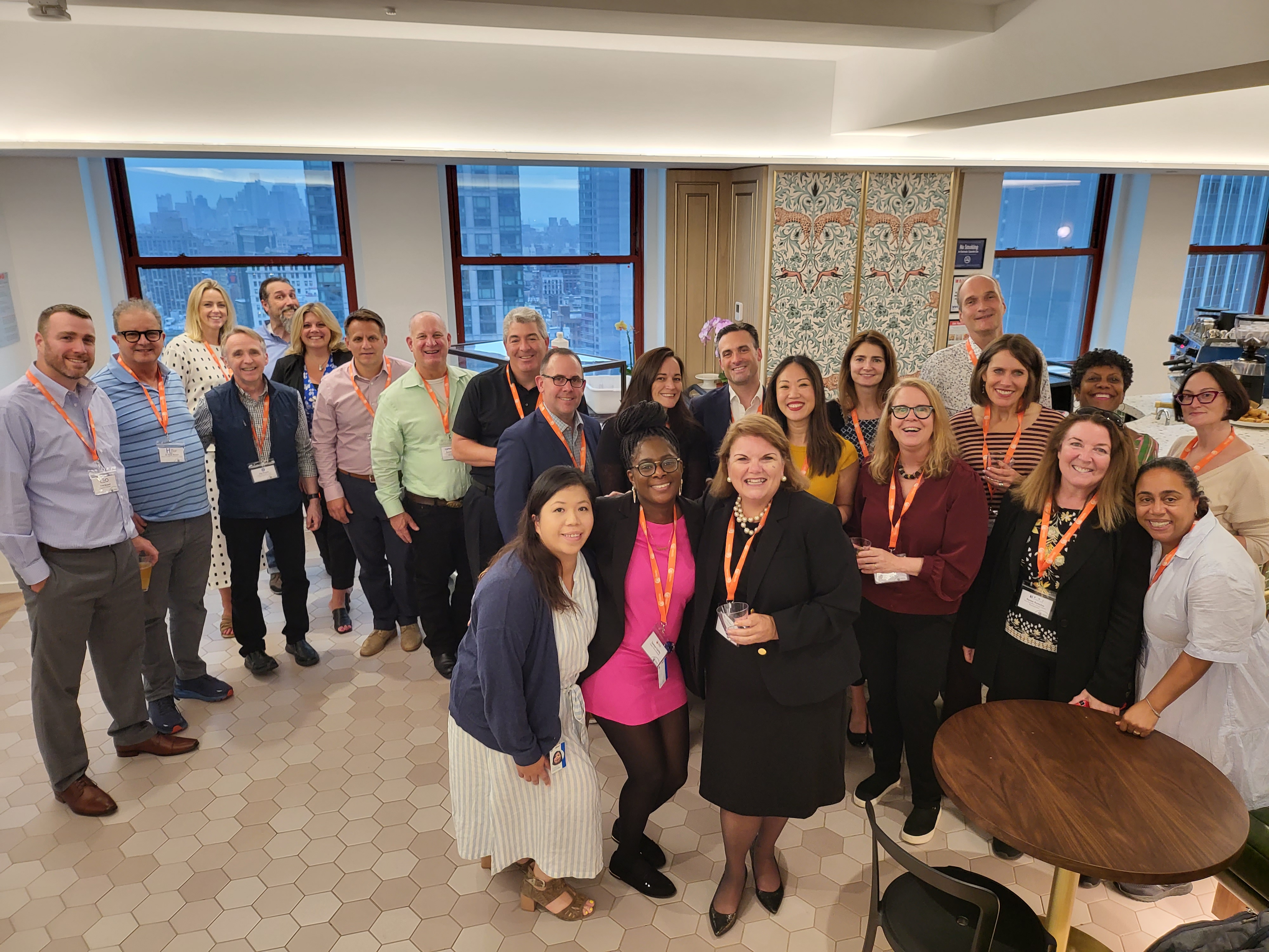 Attendees pose for a group photo at iVentiv's Learning Futures New York in June 2022