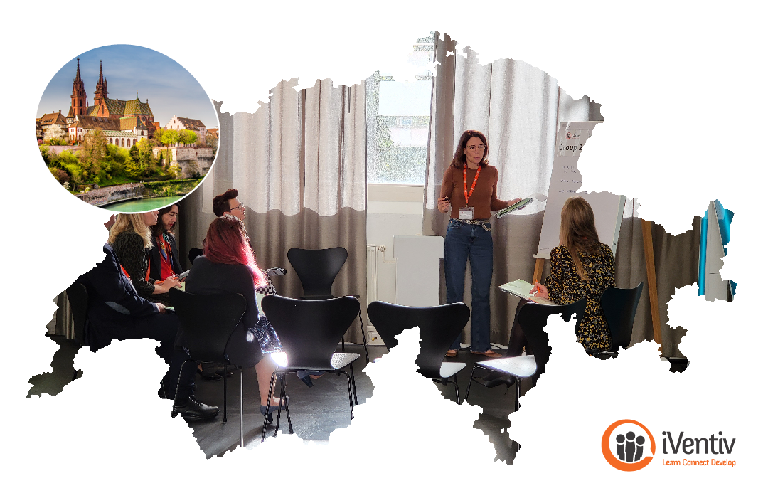 An image of a group at work at an iVentiv event, inside a map of Switzerland