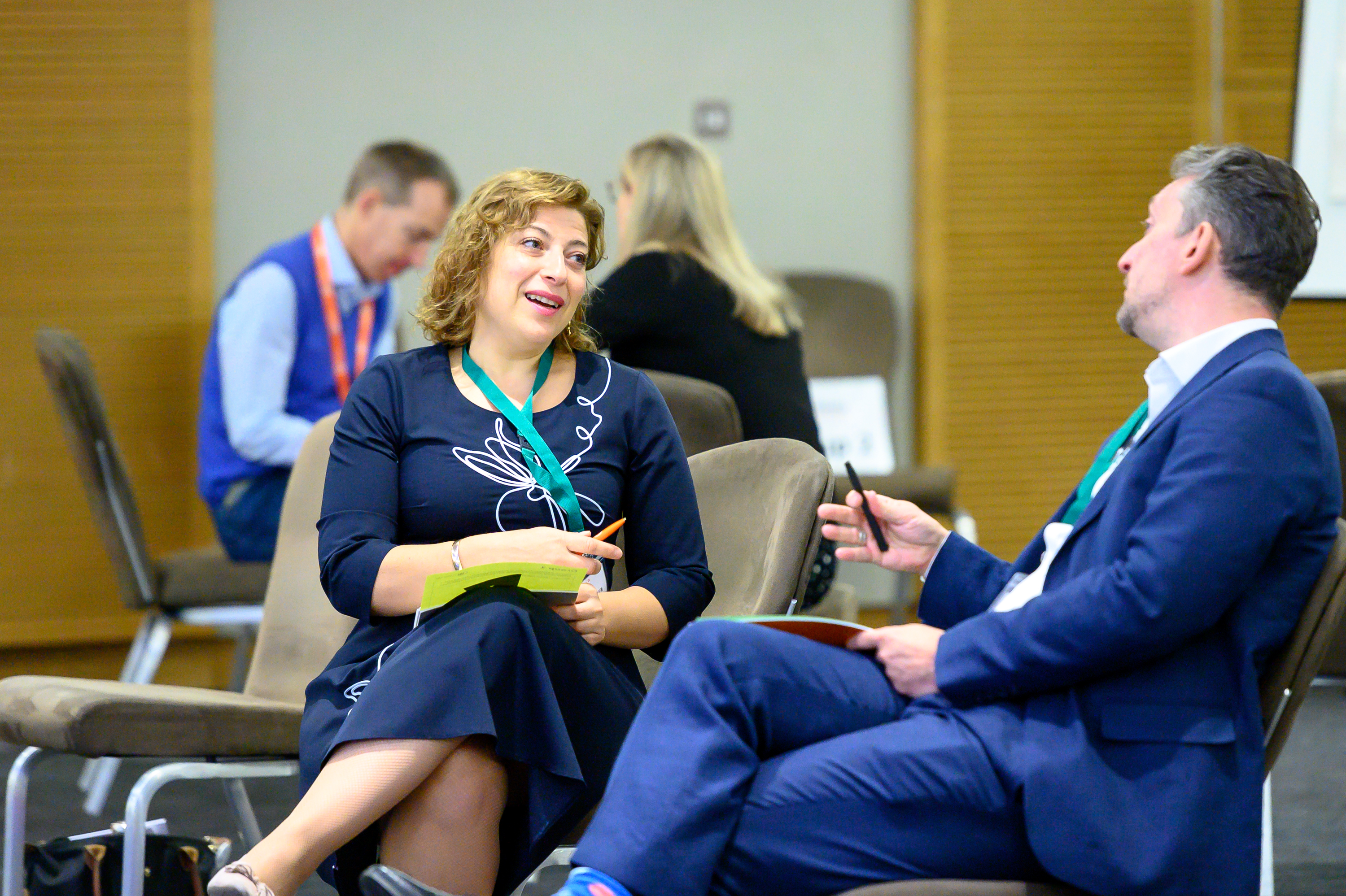 Two people in conversation at an iVentiv event