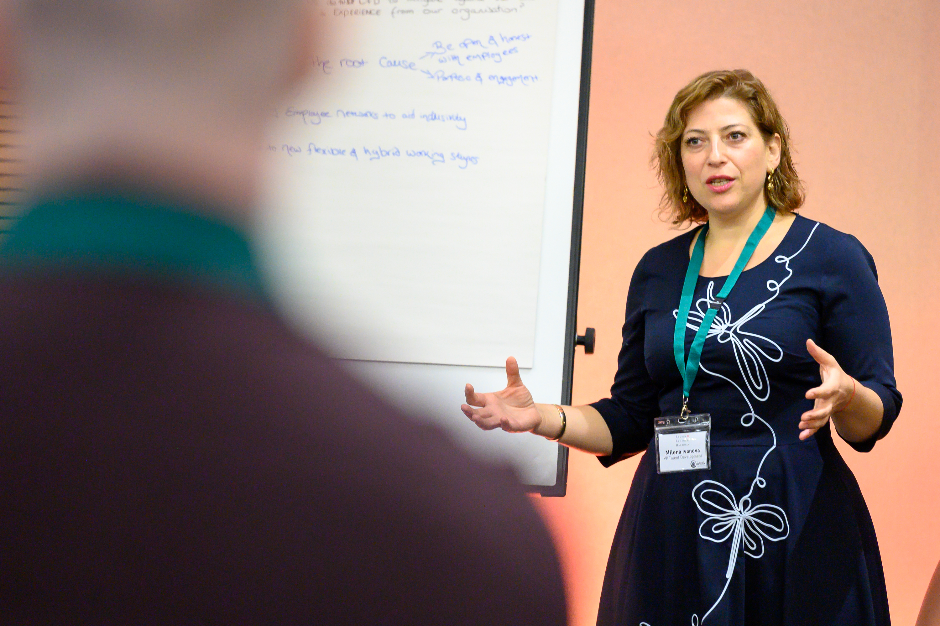 A woman presenting at an iVentiv event