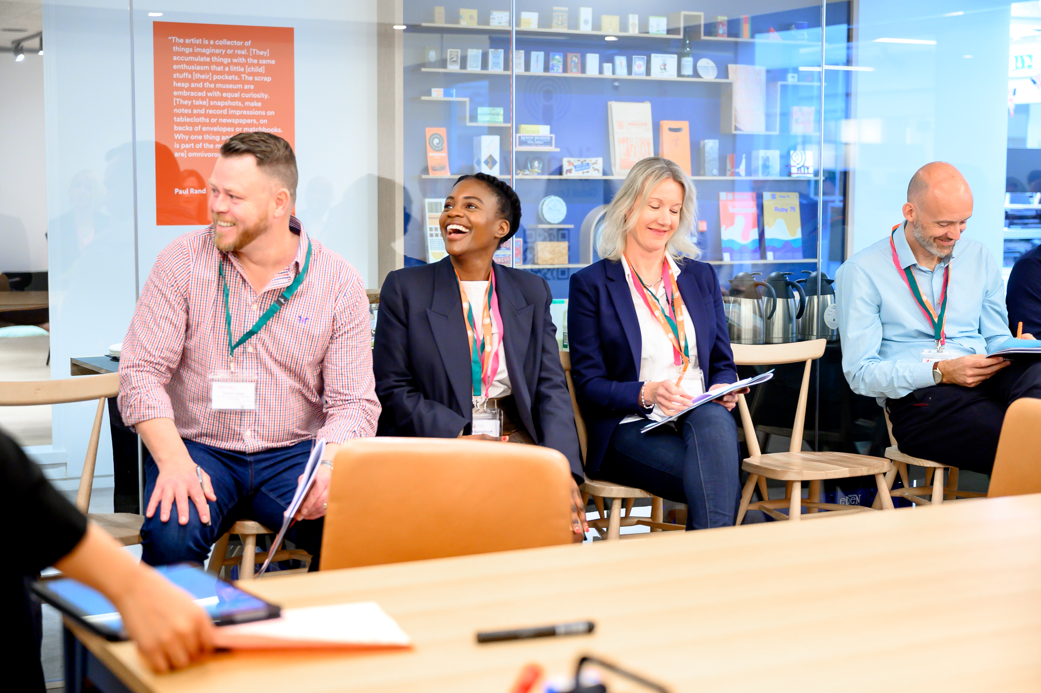 Four people sat, smiling, at an iVentiv event