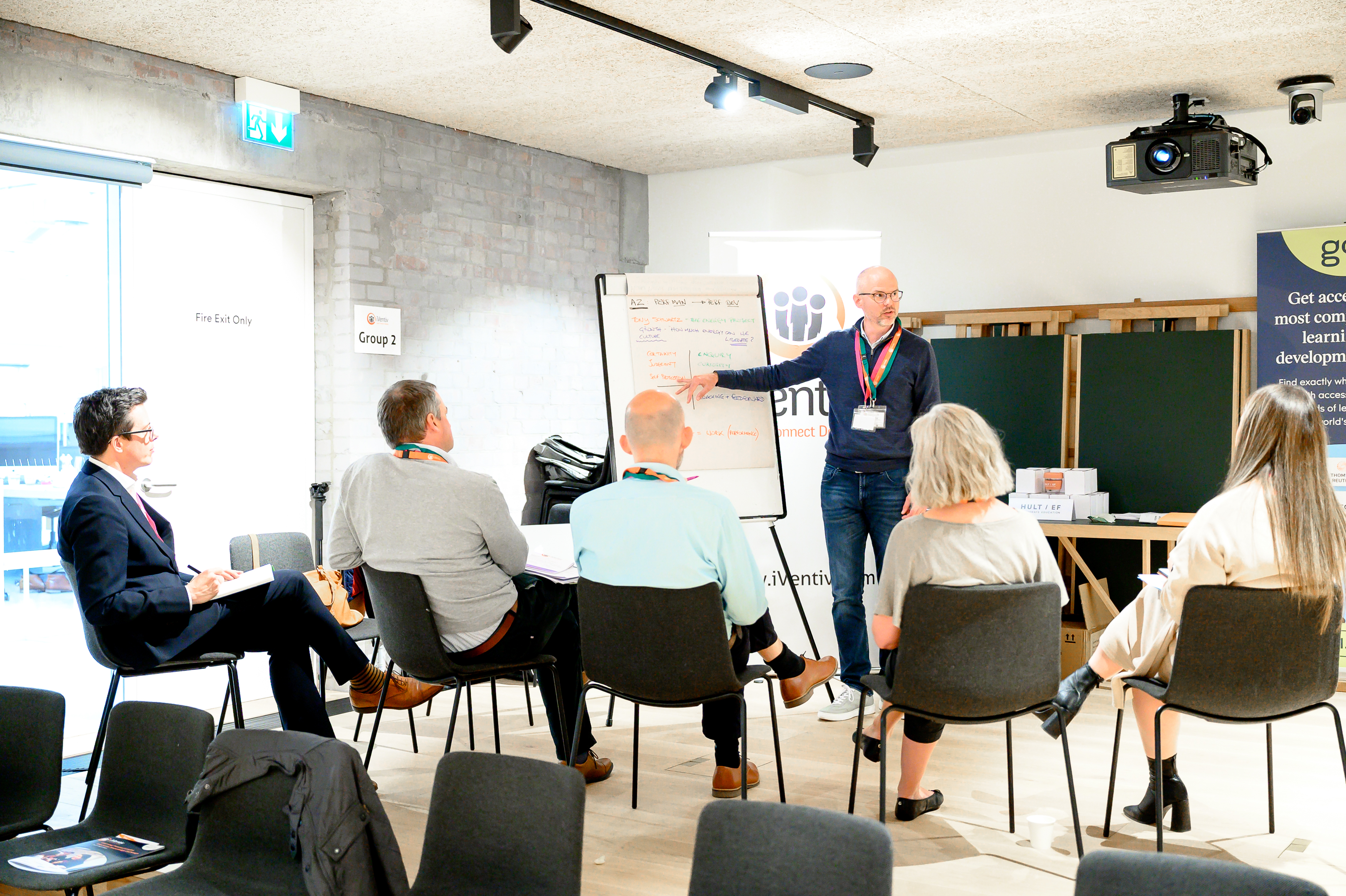 Brian Murphy leads a breakout group at an iVentiv event in 2022